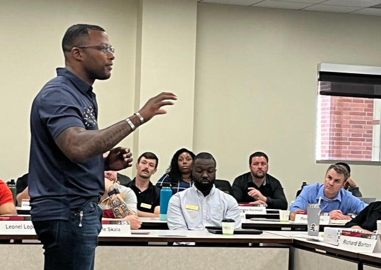 Ty Smith teaching a seminar.